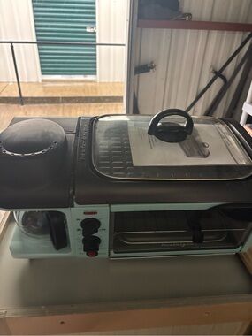 Nostalgia Mint and Black 3‑in‑1 Breakfast Station Toaster Oven with Coffee Maker
